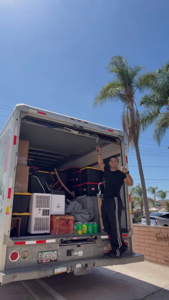 Moving truck loaded with furniture and boxes